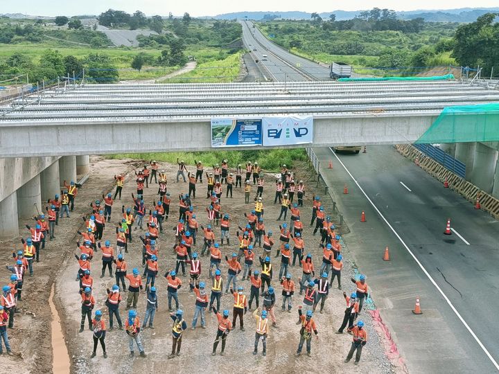 PrimeBMD workers at the Montclaire Interchange, Philippines